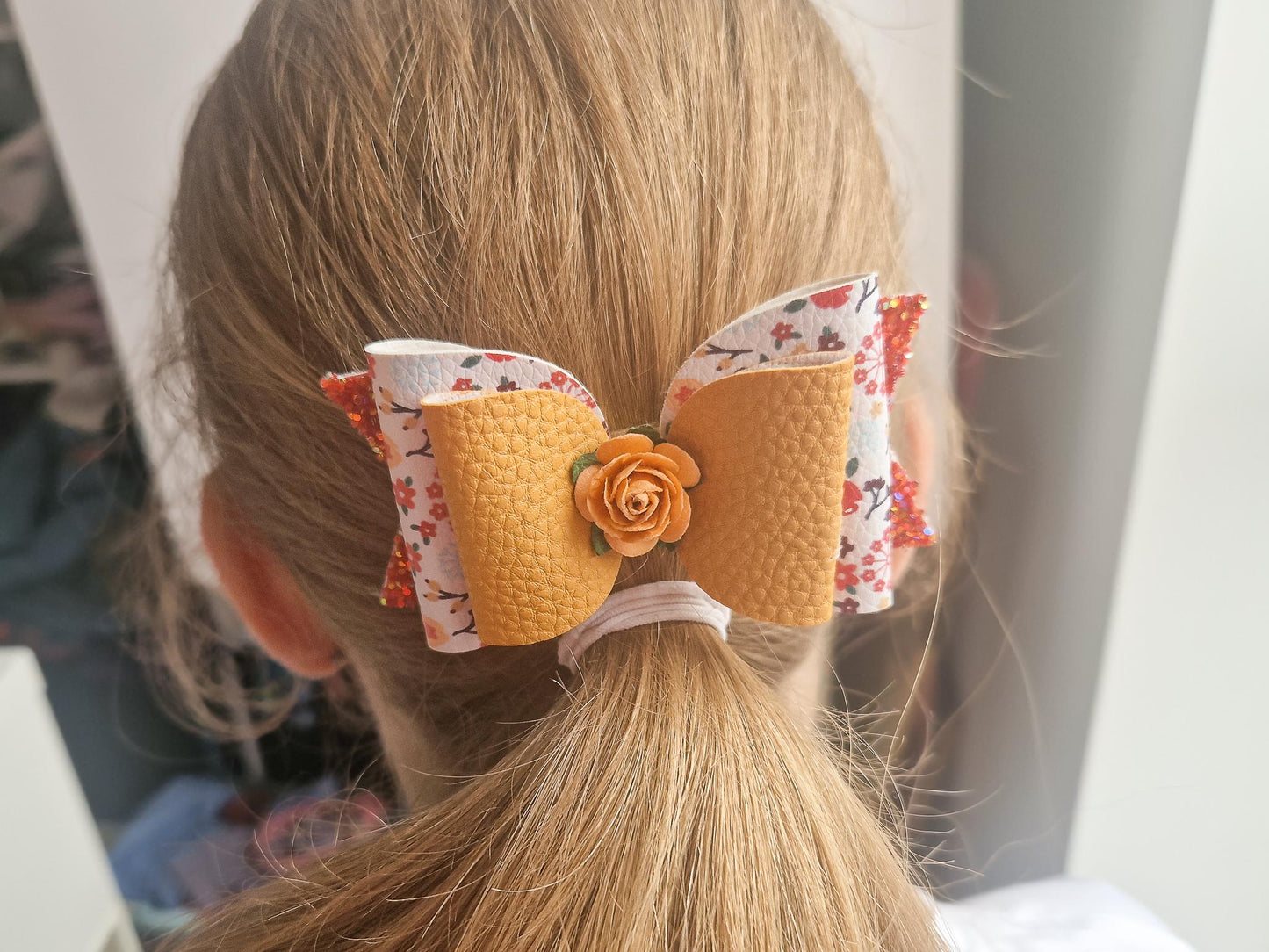 Large Hair bow in Autumn Colours & Orange flower.
