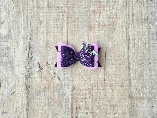 Halloween Hair bow in a purple glitter bat design.