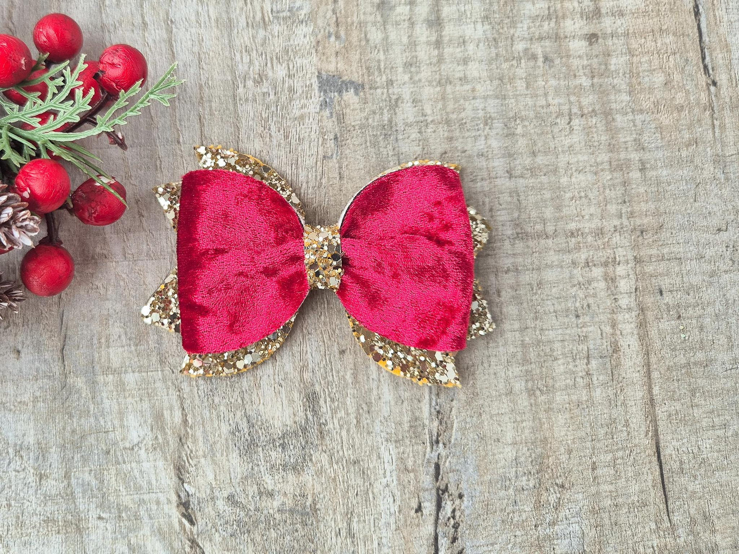 Red Christmas Hair bow for Girls made with Red velvet and gold glitter, the perfect accessory for older girls upwards