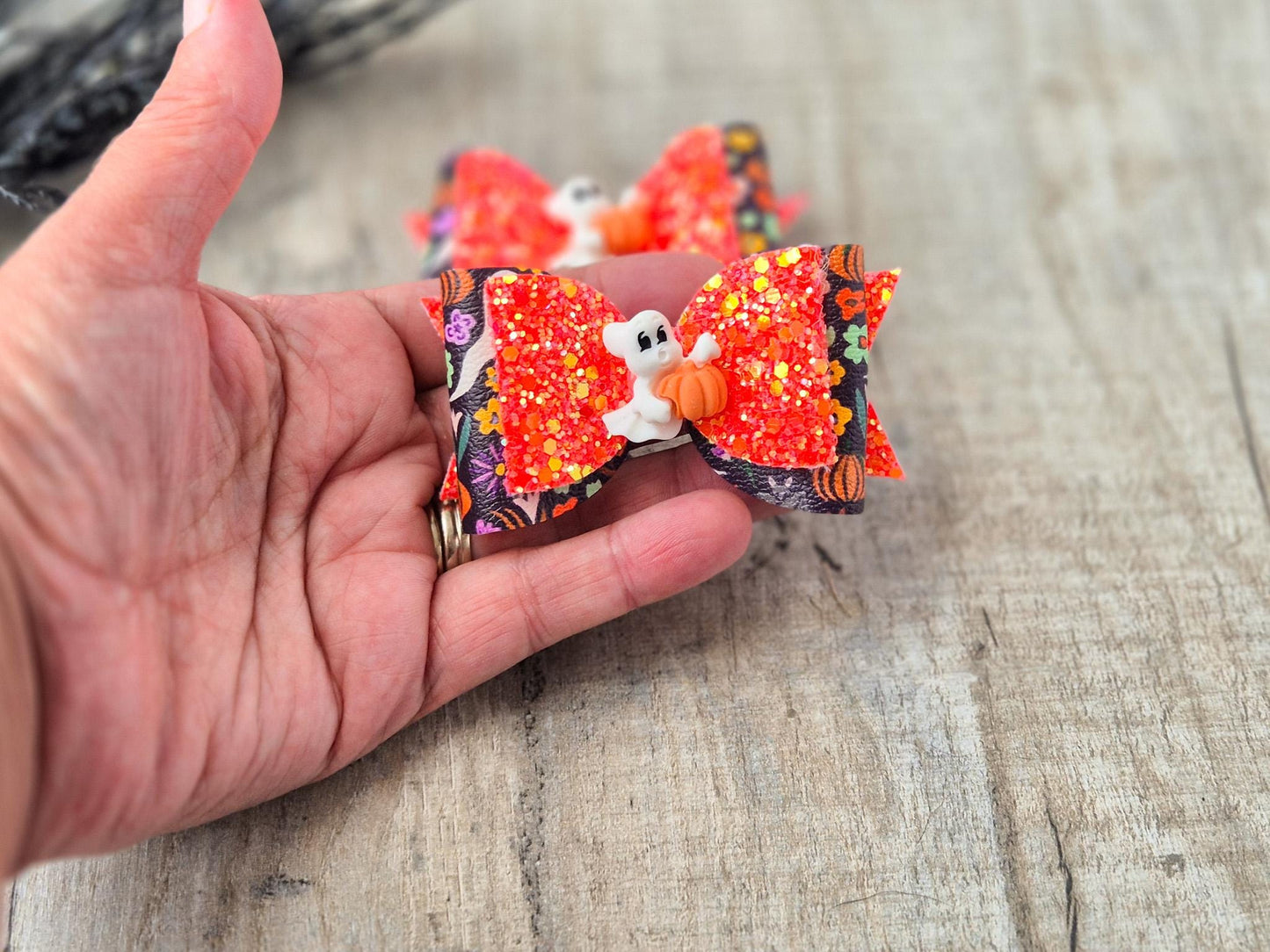 Orange Halloween Hair bow with a Cute Ghost and Glitter fabric .