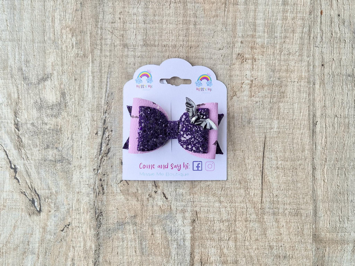 Halloween Hair bow in a purple glitter bat design.