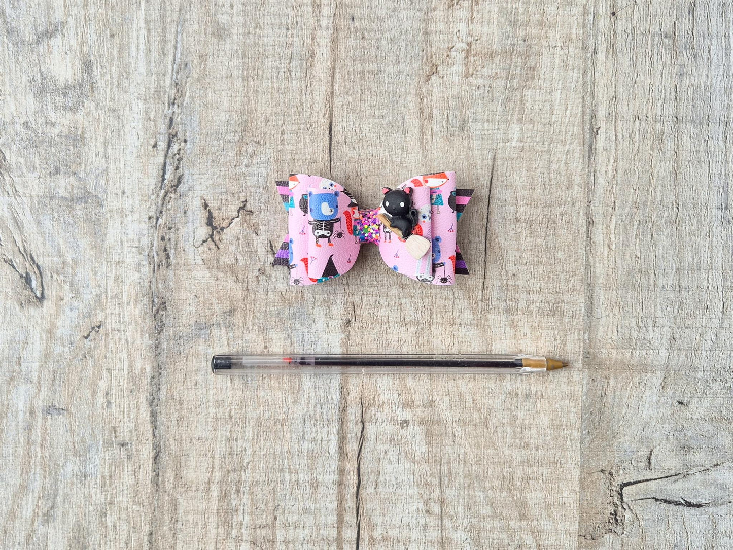 Halloween Pink Witches Hair bow, with a Cute Cat on Broom Embellishment.