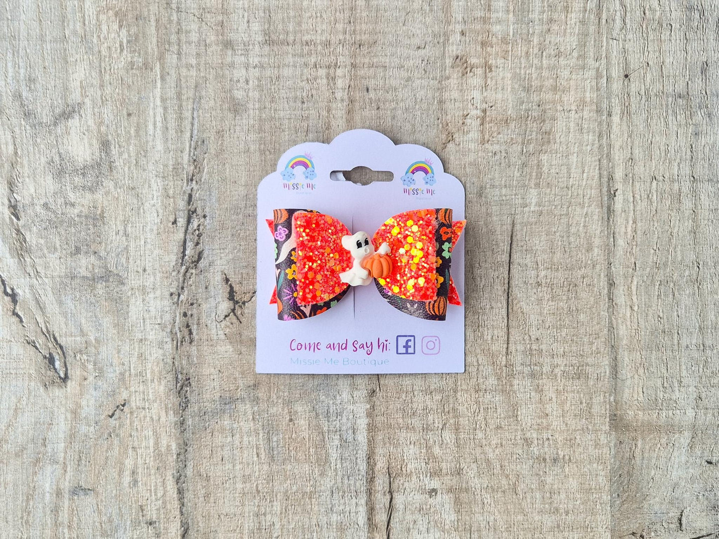 Orange Halloween Hair bow with a Cute Ghost and Glitter fabric .