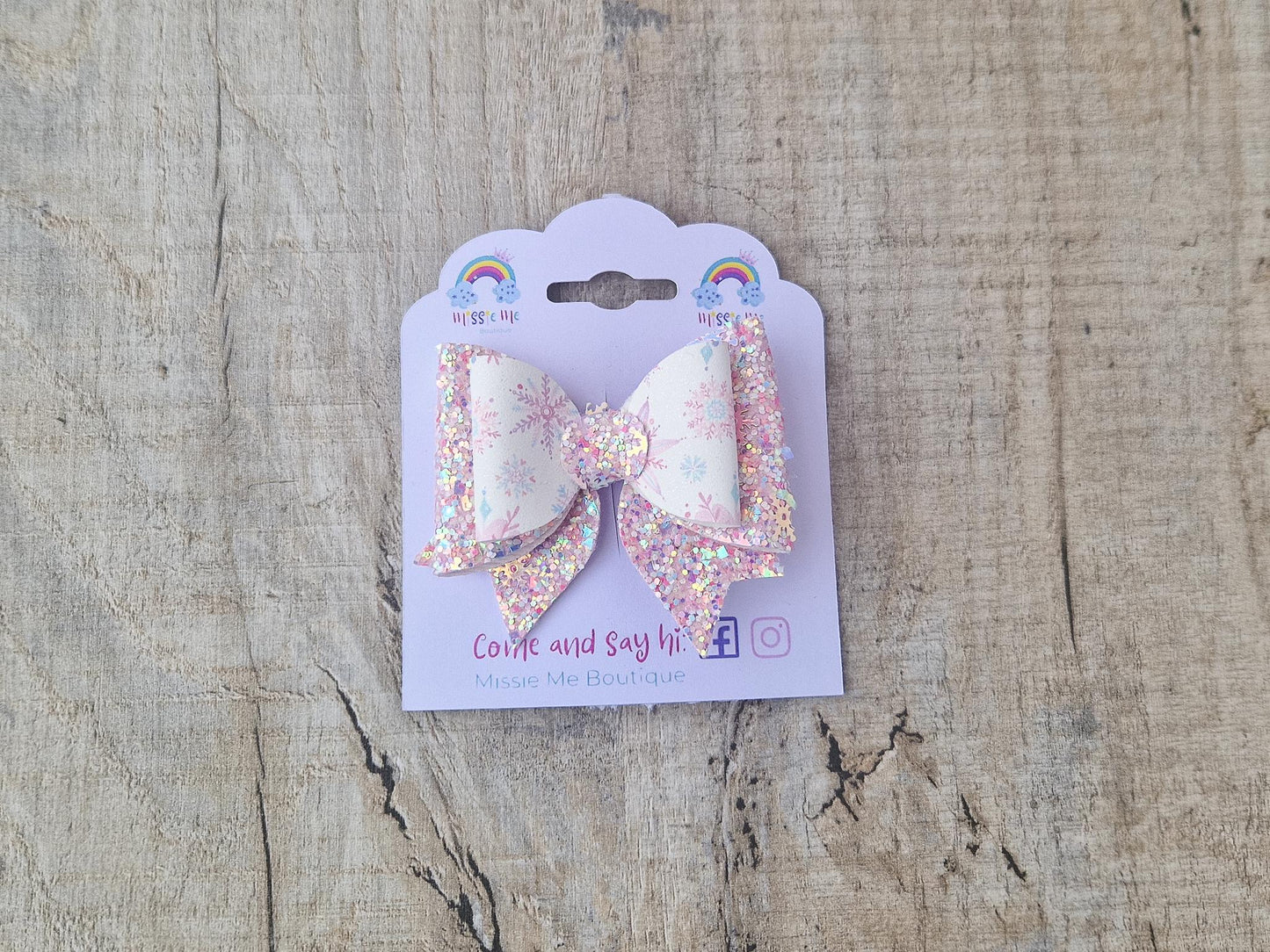 Pink Christmas Glitter Hair Bow in a Snowflake Design For Toddler or Girl.