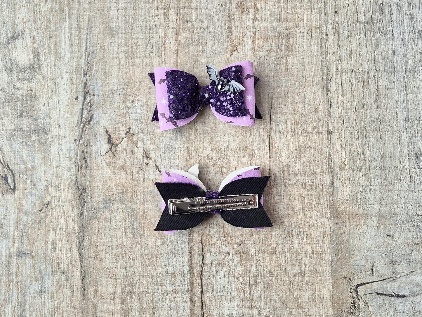 Halloween Hair bow in a purple glitter bat design.