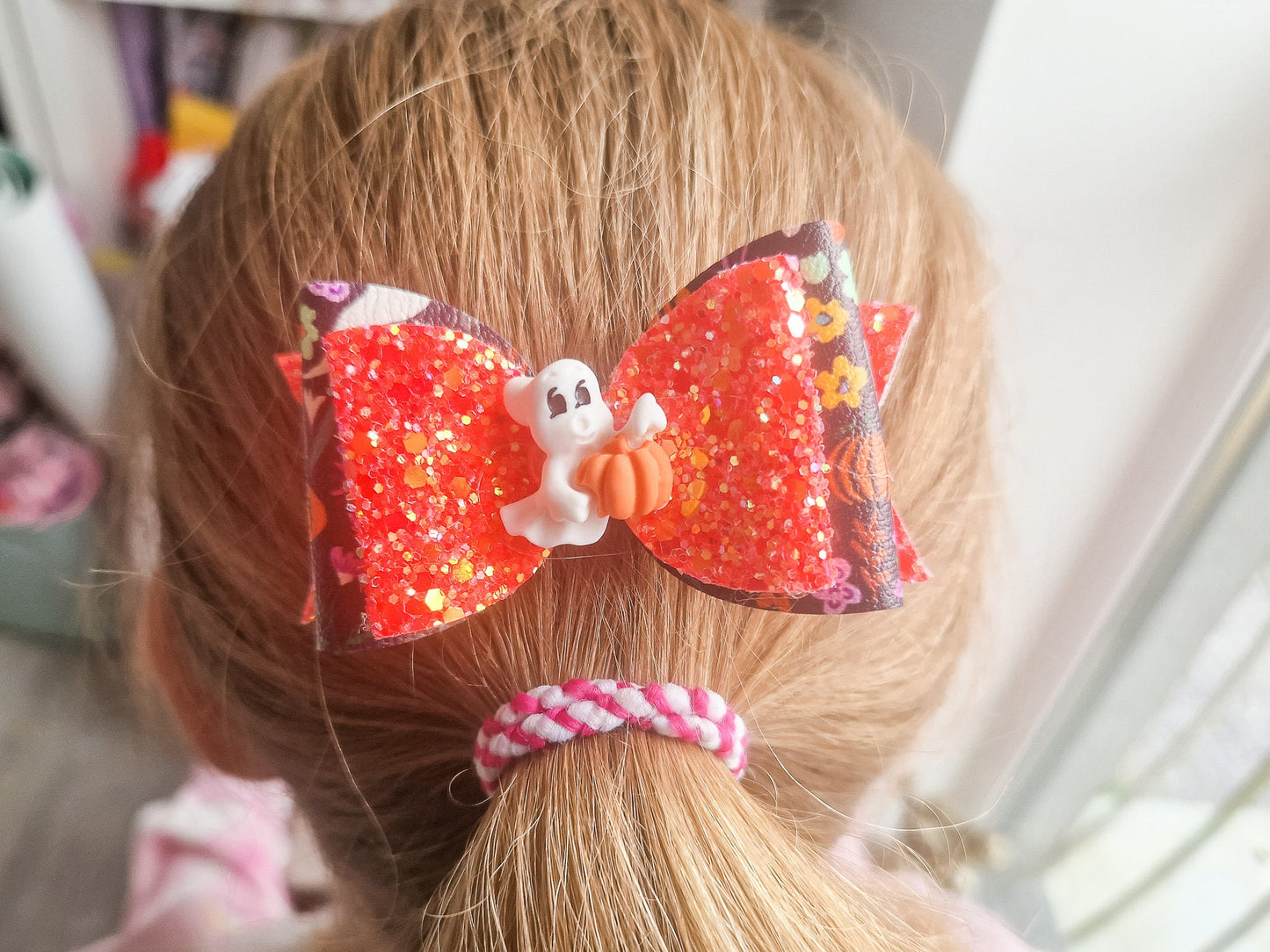 Orange Halloween Hair bow with a Cute Ghost and Glitter fabric .