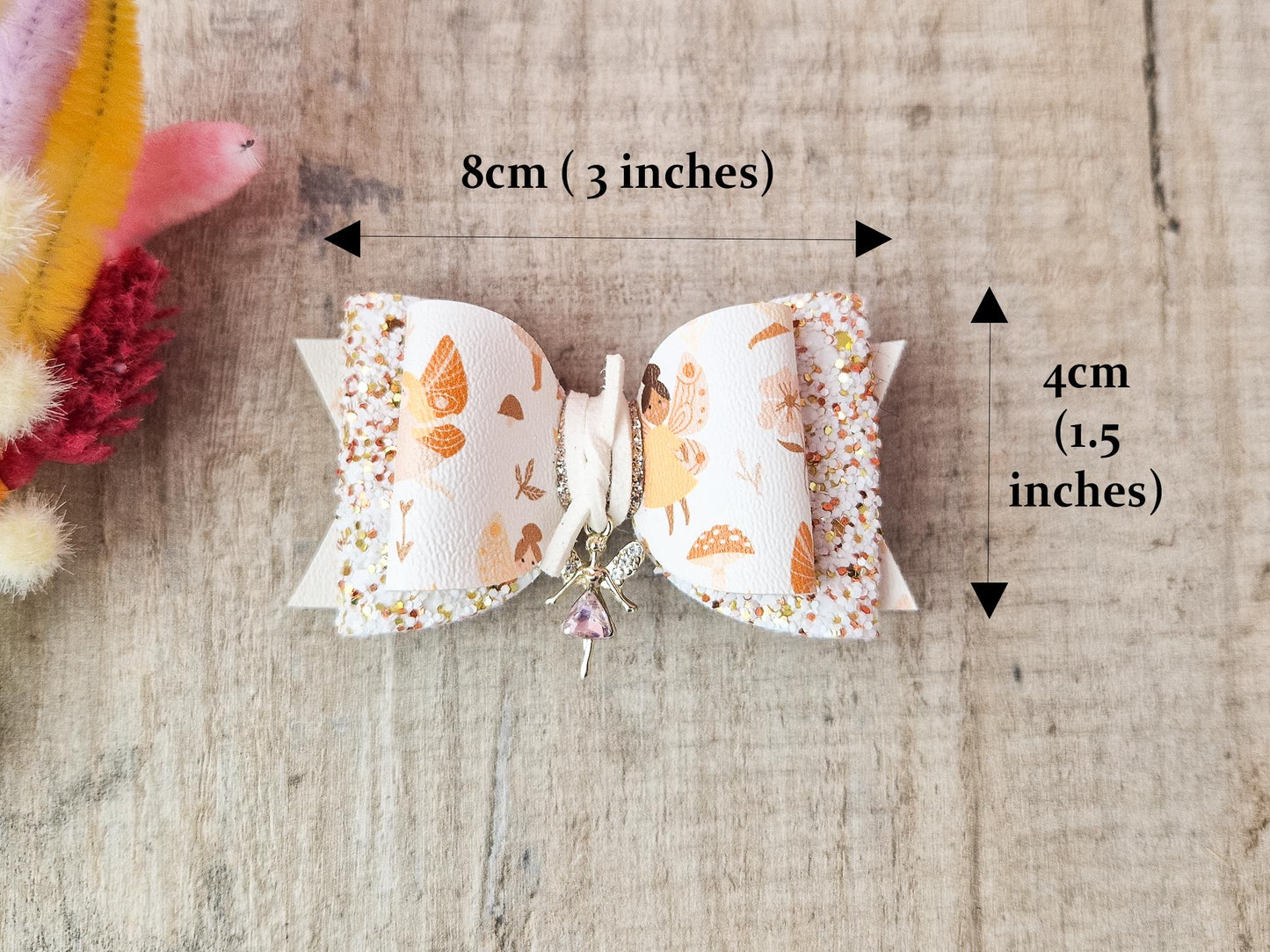 Autumn Fairy Hair Bow, finished with a Cute Fairy Charm.