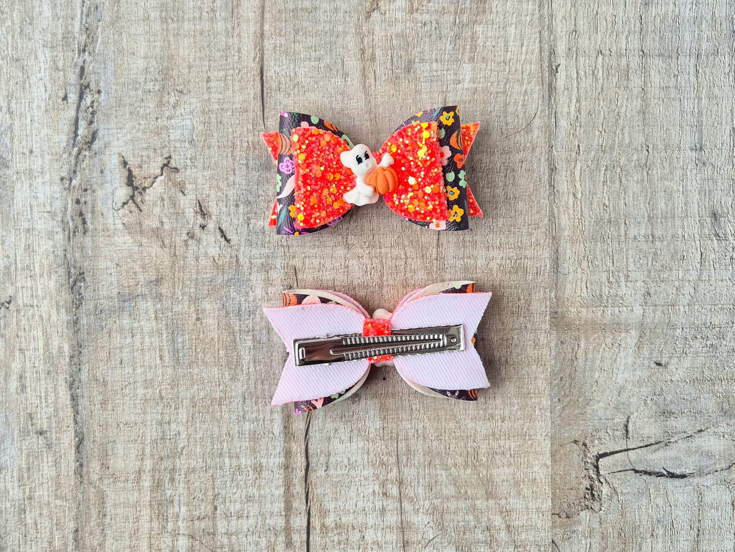 Orange Halloween Hair bow with a Cute Ghost and Glitter fabric .