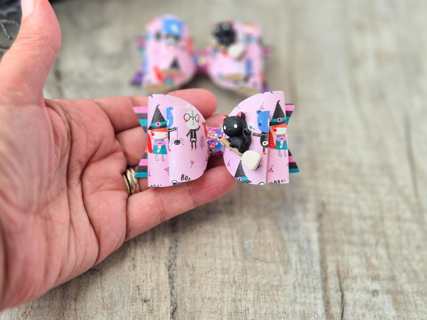 Halloween Pink Witches Hair bow, with a Cute Cat on Broom Embellishment.