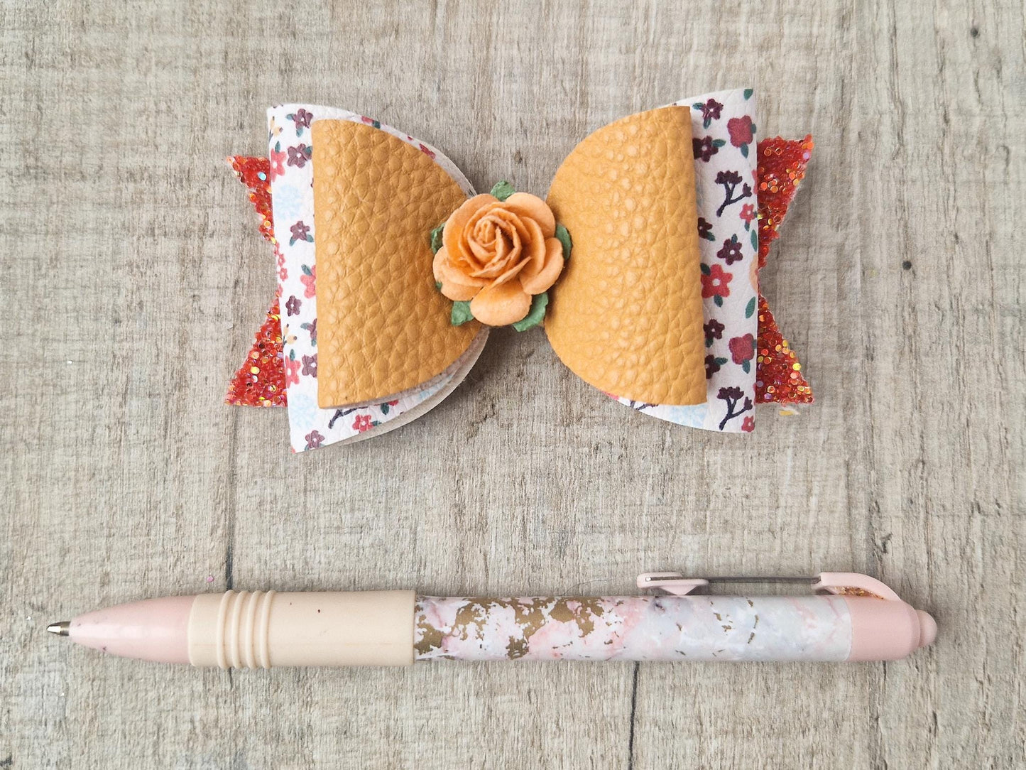 Large Hair bow in Autumn Colours & Orange flower.