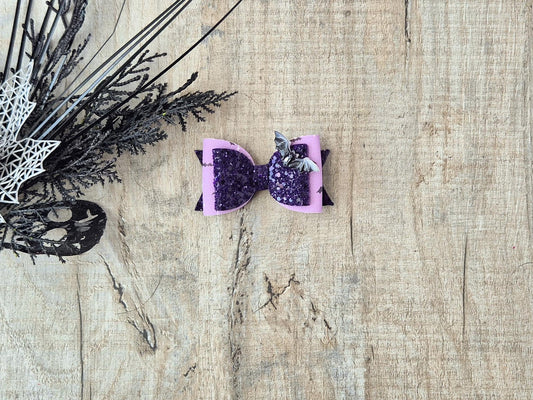 Halloween Hair bow  in a purple glitter bat design.