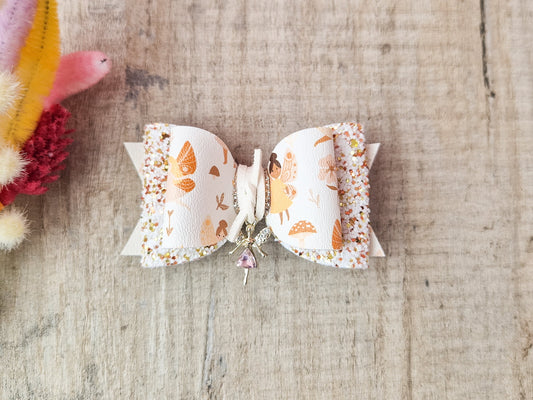 Autumn Fairy Hair Bow, finished with a Cute Fairy Charm.